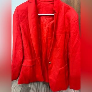 Bright orange cotton blazer, with shoulder pads